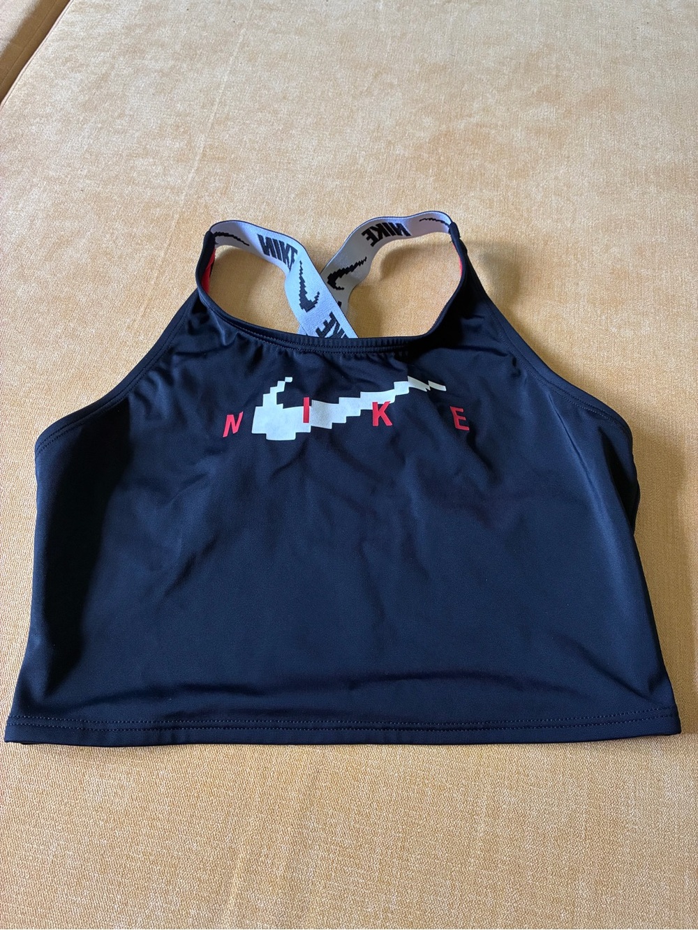 Nike Black bra with White Pixel Swoosh and Red Lettering, size large